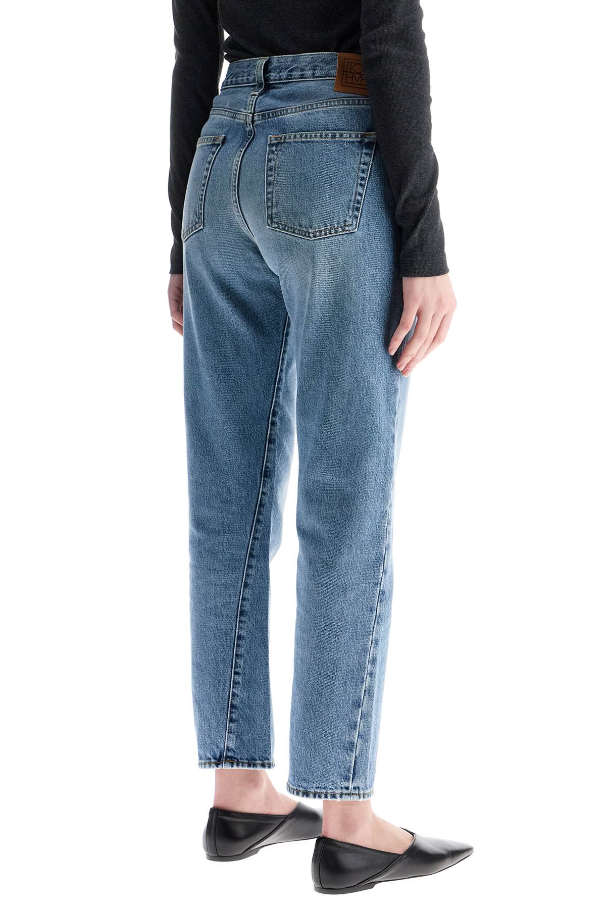 Worn Blue Organic Cotton Jeans With Twisted Seams  - Blue