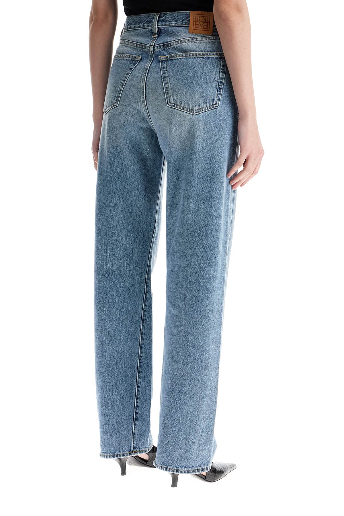 Wide Leg Organic Cotton Jeans In Worn Blue With Twisted Seams  - Blue