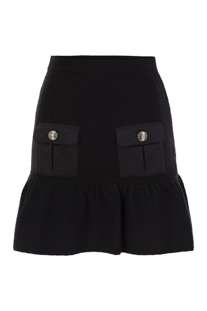 Bouclé wool miniskirt with technical sail cloth pockets