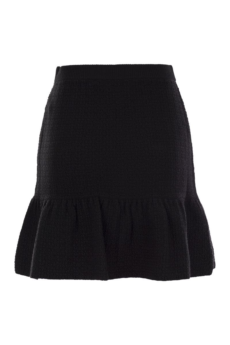 Bouclé wool miniskirt with technical sail cloth pockets