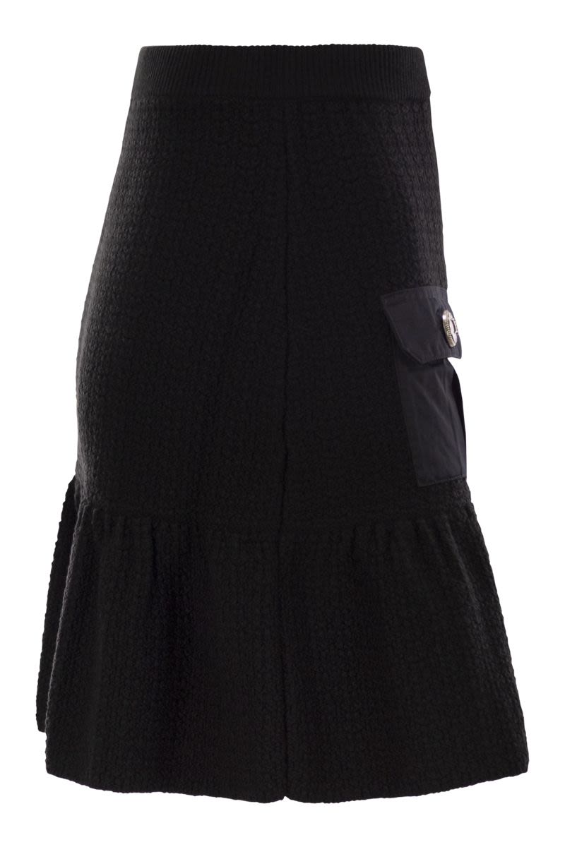 Bouclé wool miniskirt with technical sail cloth pockets