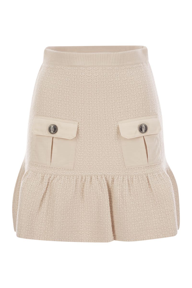 Bouclé wool miniskirt with technical sail cloth pockets