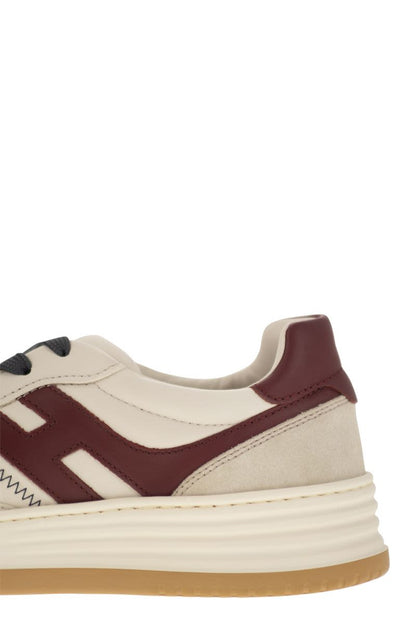 H630 - Leather lace-up trainers