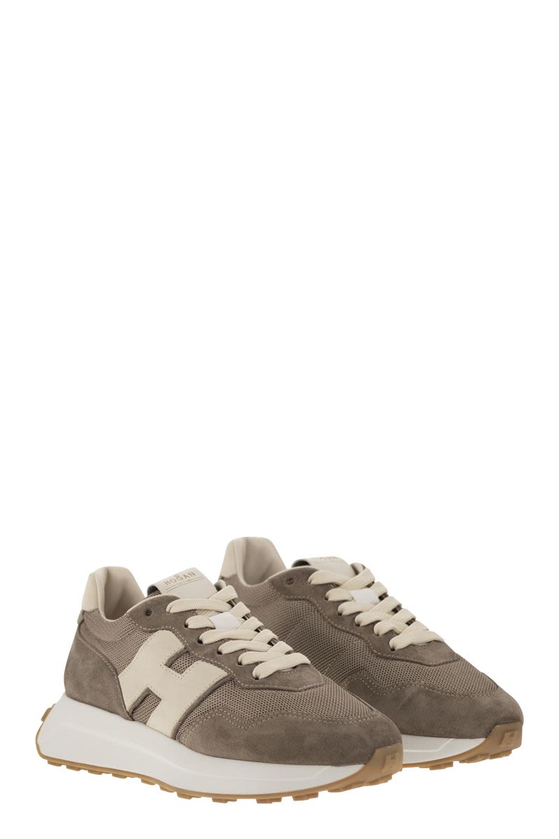 H641 - Leather and canvas trainers