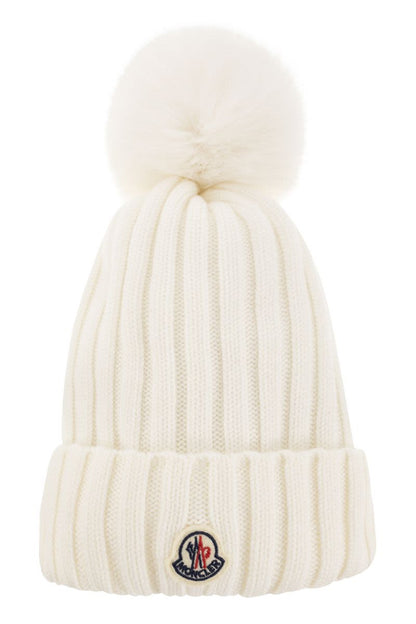 Wool cap with pom-pom