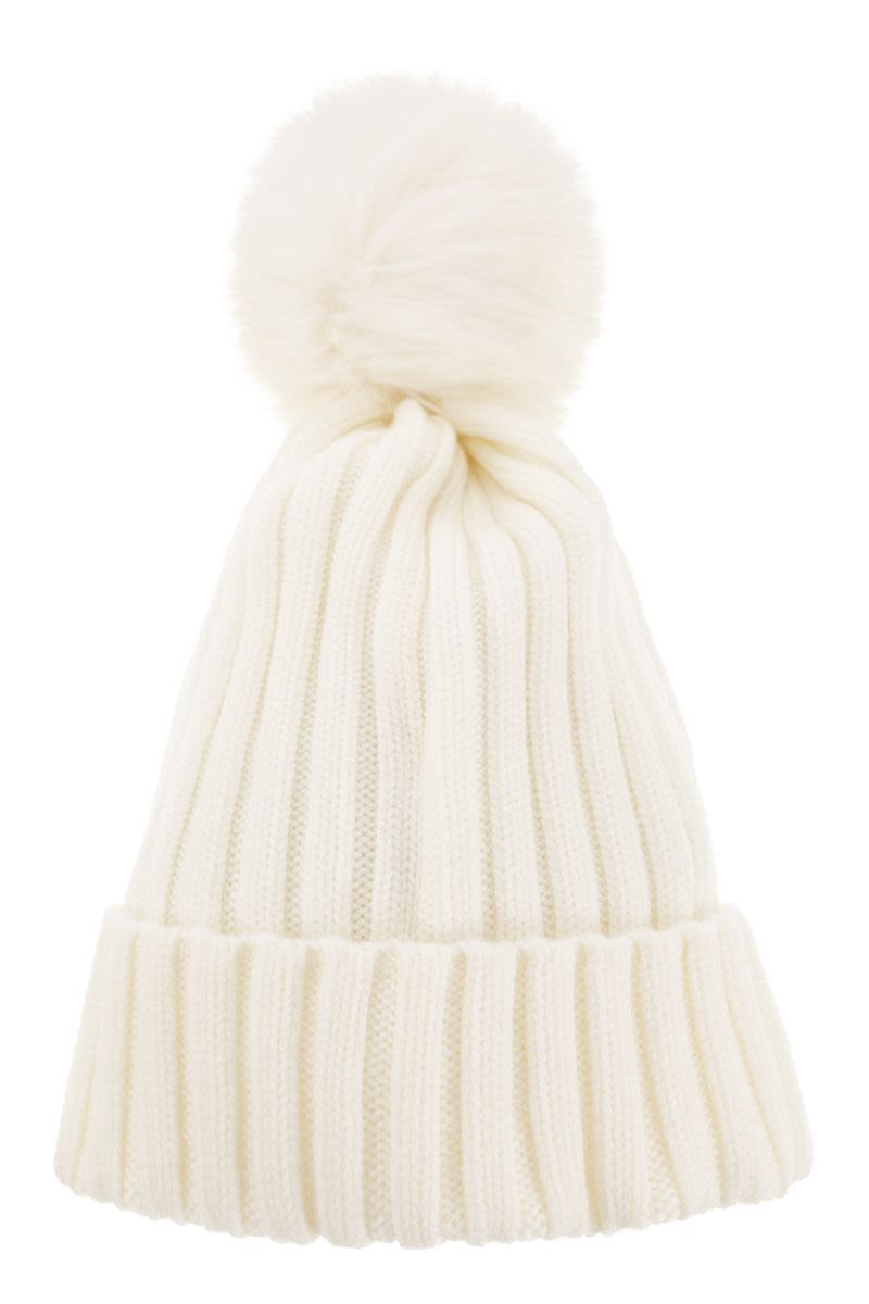 Wool cap with pom-pom