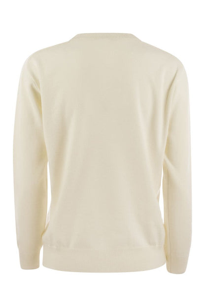 Cashmere sweater with neck jewel