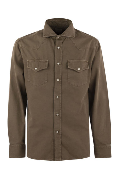 Easy-fit shirt in light garment-dyed denim with press studs, epaulettes and pockets