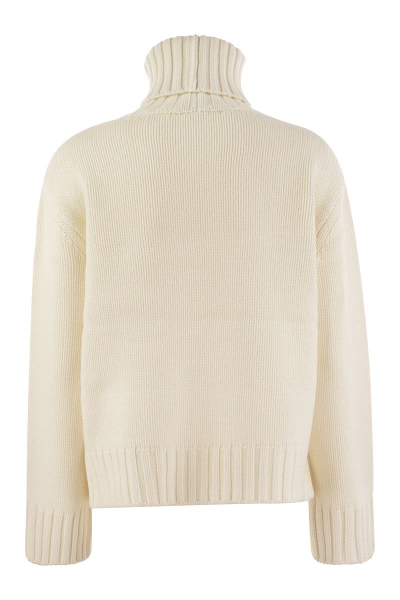 Wool, silk and cashmere blend turtleneck sweater