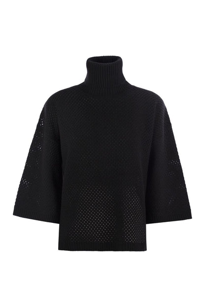 Platinum over turtleneck sweater