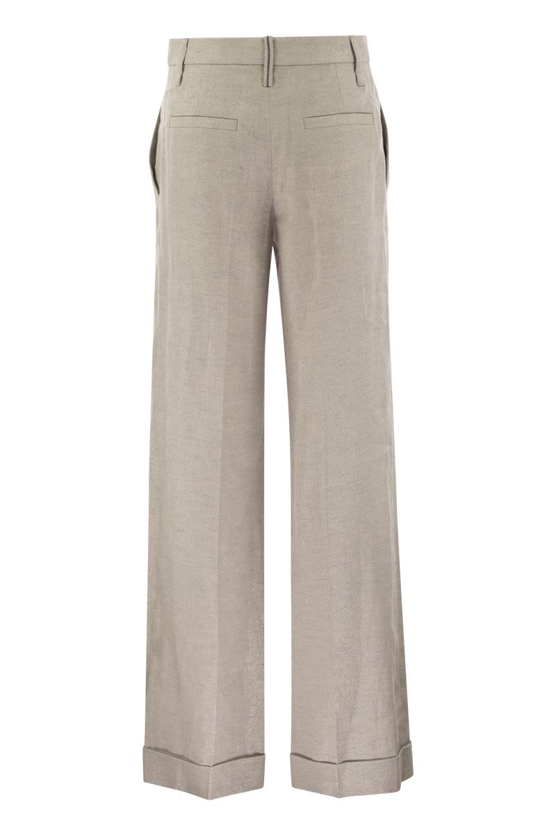 Flared loose-fitting trousers in sparkling linen twill with necklace