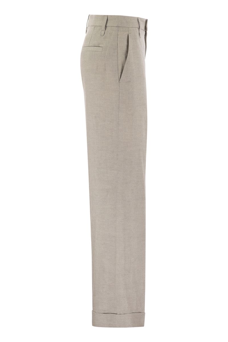 Flared loose-fitting trousers in sparkling linen twill with necklace