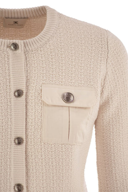 Bouclé wool cardigan with technical sail cloth pockets