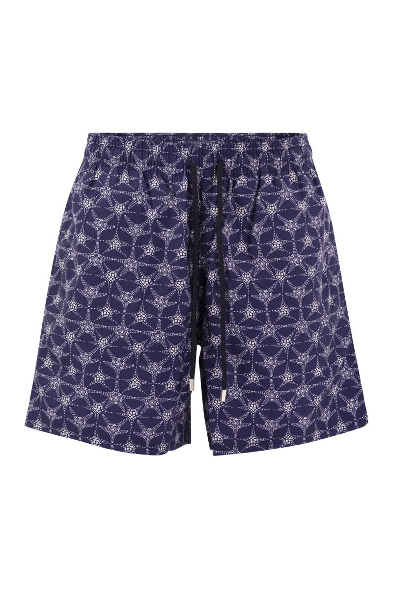 Star patterned beach shorts