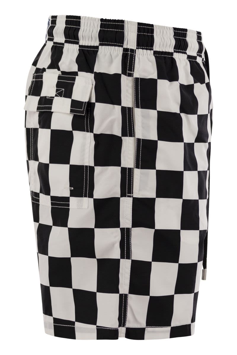 Swim shorts with checkered pattern