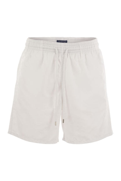 Plain-coloured beach shorts