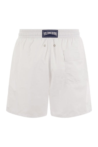 Plain-coloured beach shorts