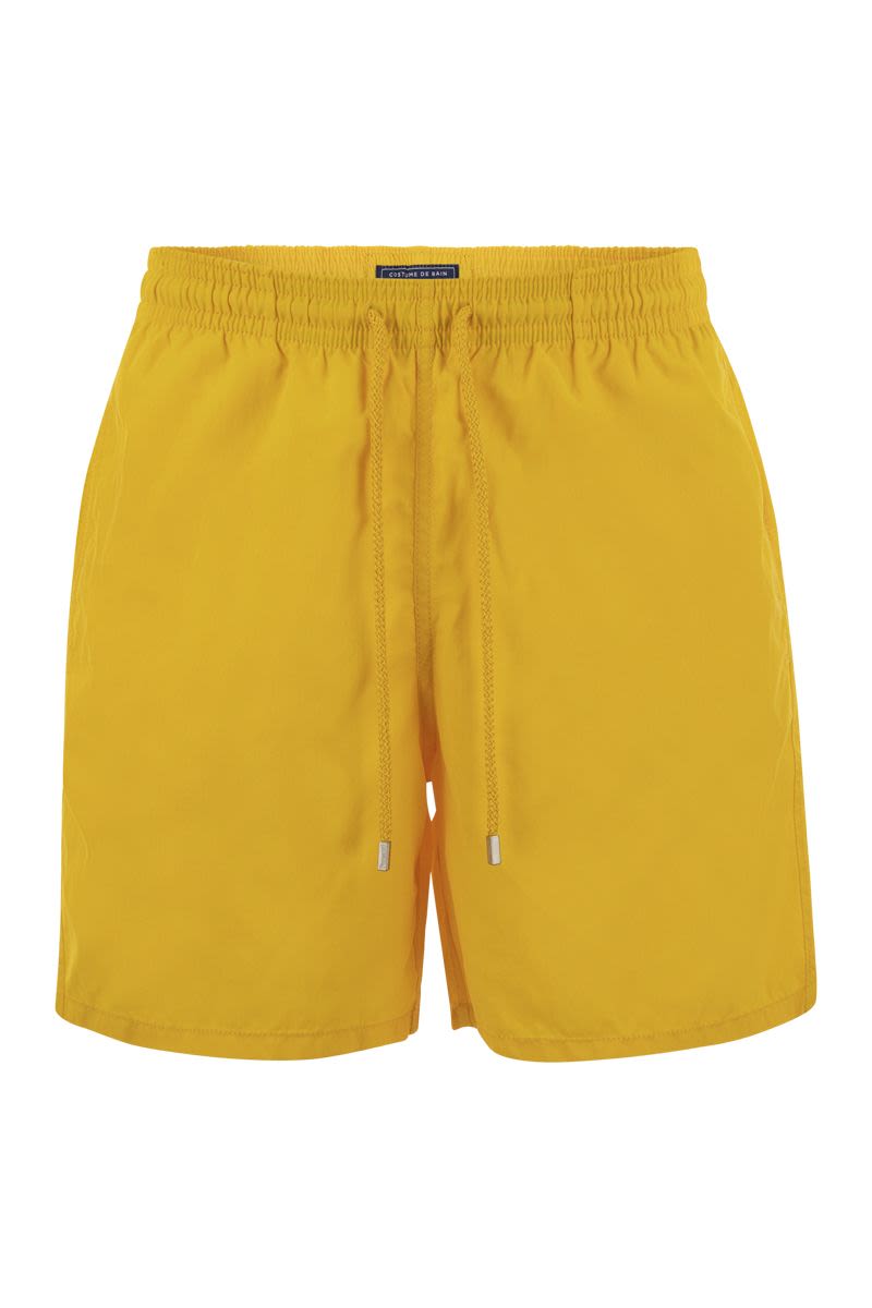 Plain-coloured beach shorts