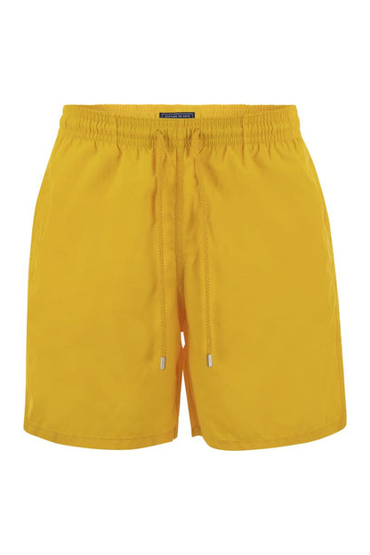 Plain-coloured beach shorts