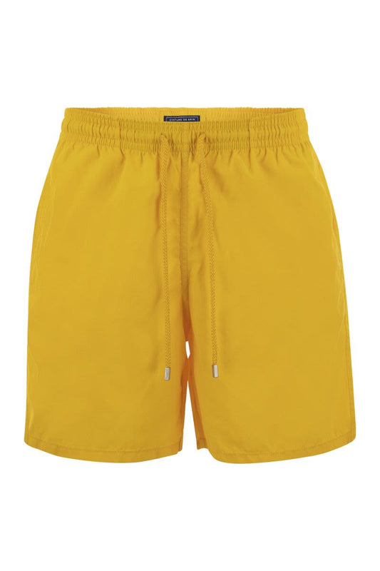 Plain-coloured beach shorts