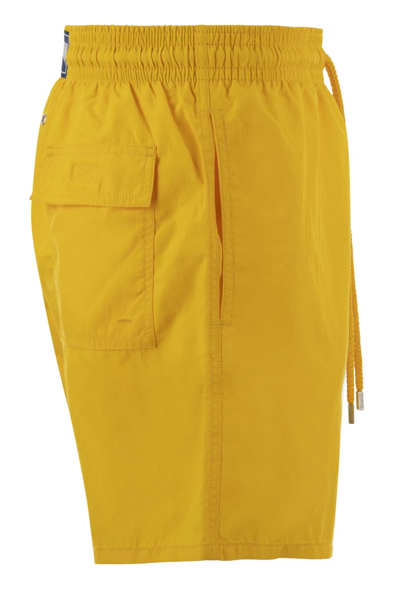 Plain-coloured beach shorts