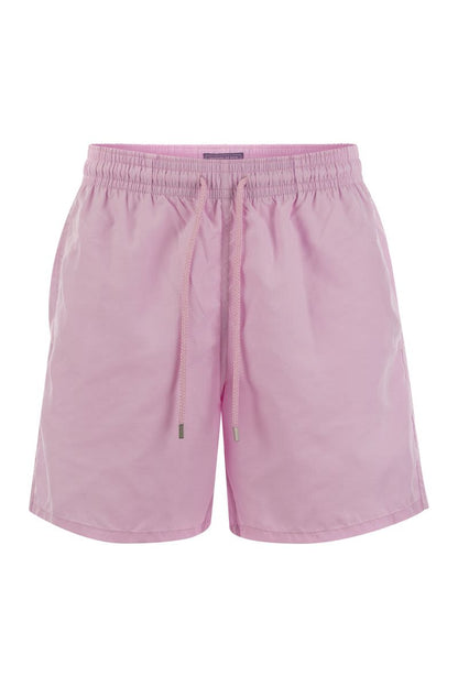 Plain-coloured beach shorts