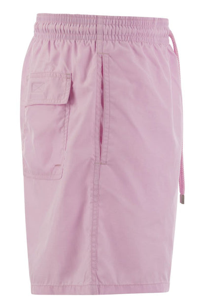 Plain-coloured beach shorts