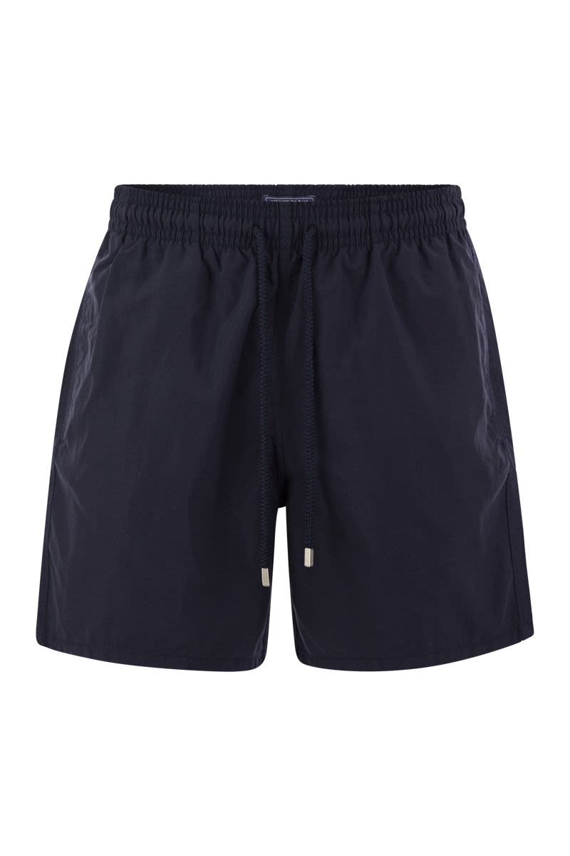 Plain-coloured beach shorts