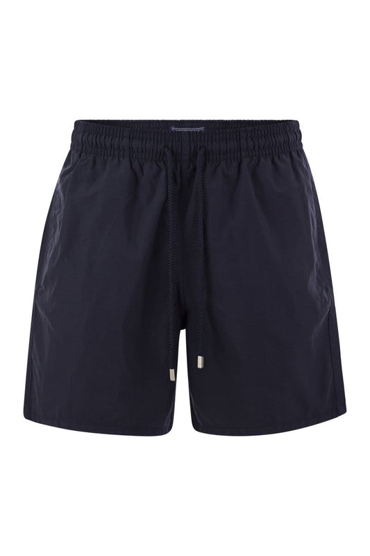 Plain-coloured beach shorts