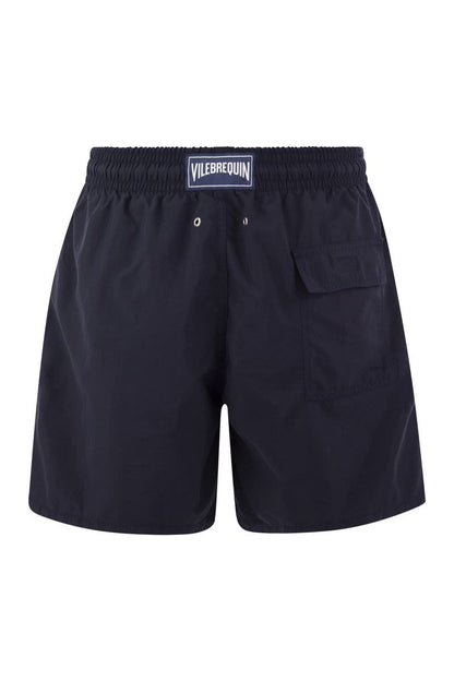 Plain-coloured beach shorts