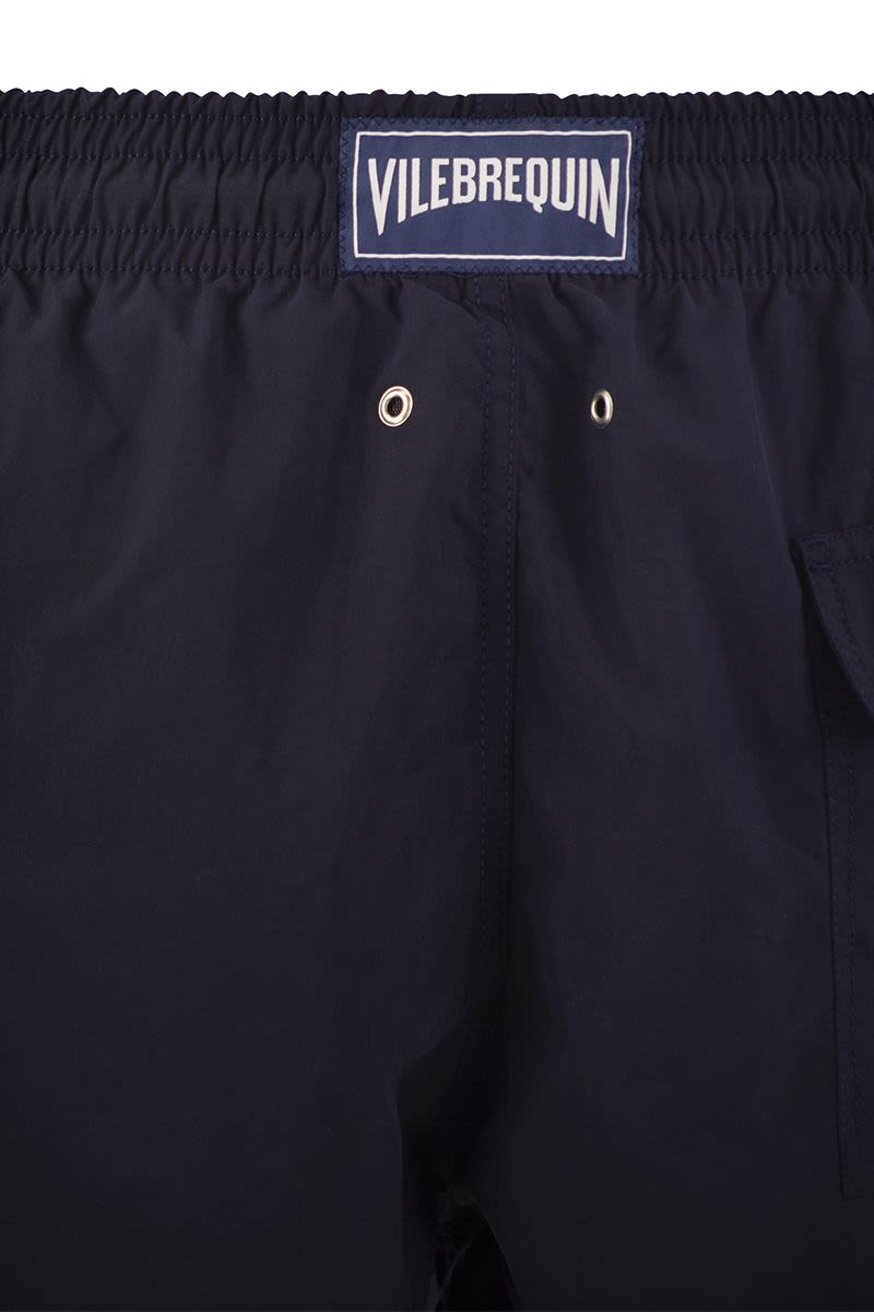 Plain-coloured beach shorts