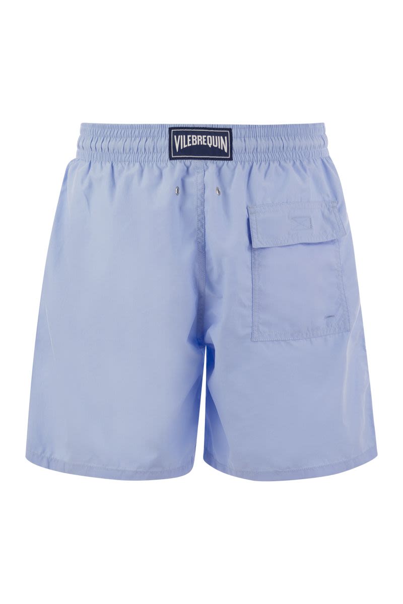 Plain-coloured beach shorts