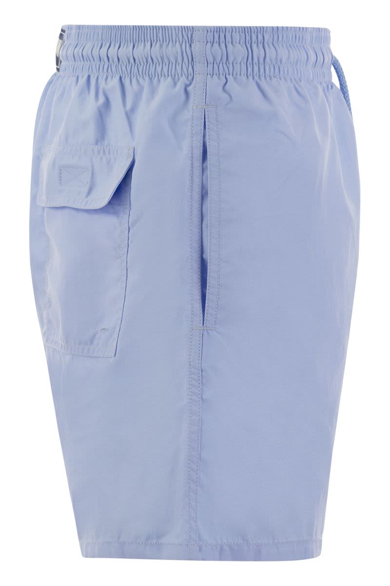 Plain-coloured beach shorts