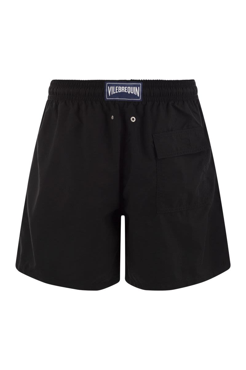 Plain-coloured beach shorts