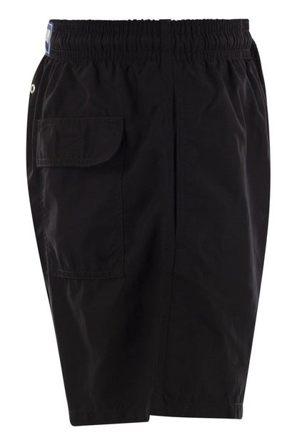 Plain-coloured beach shorts