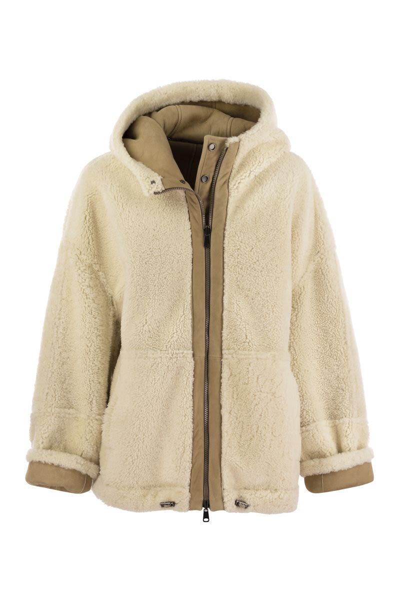 Reversible shearling outerwear with jewellery