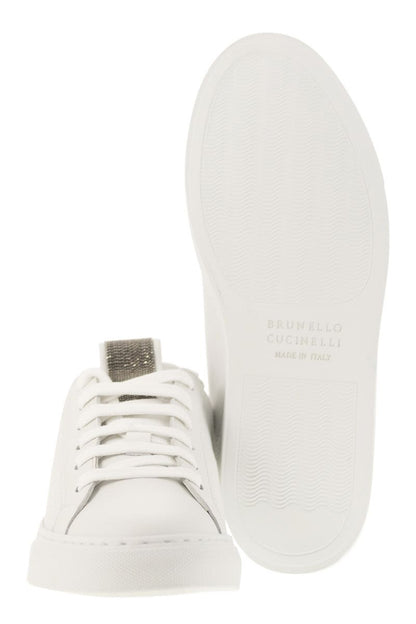 Matt calfskin trainers with precious detail