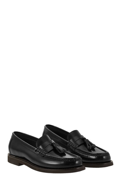 Minimal calfskin moccasin with shiny tassels