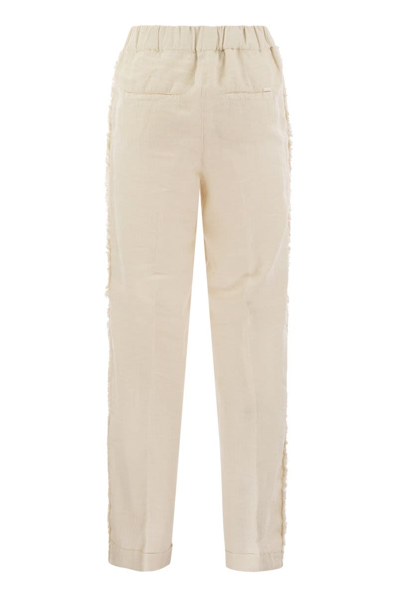 Linen trousers with side fringes