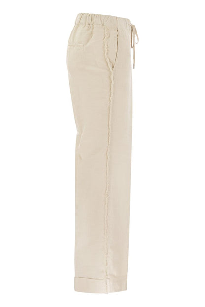 Linen trousers with side fringes