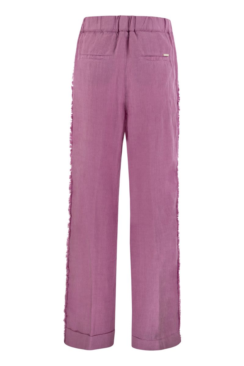 Linen trousers with side fringes