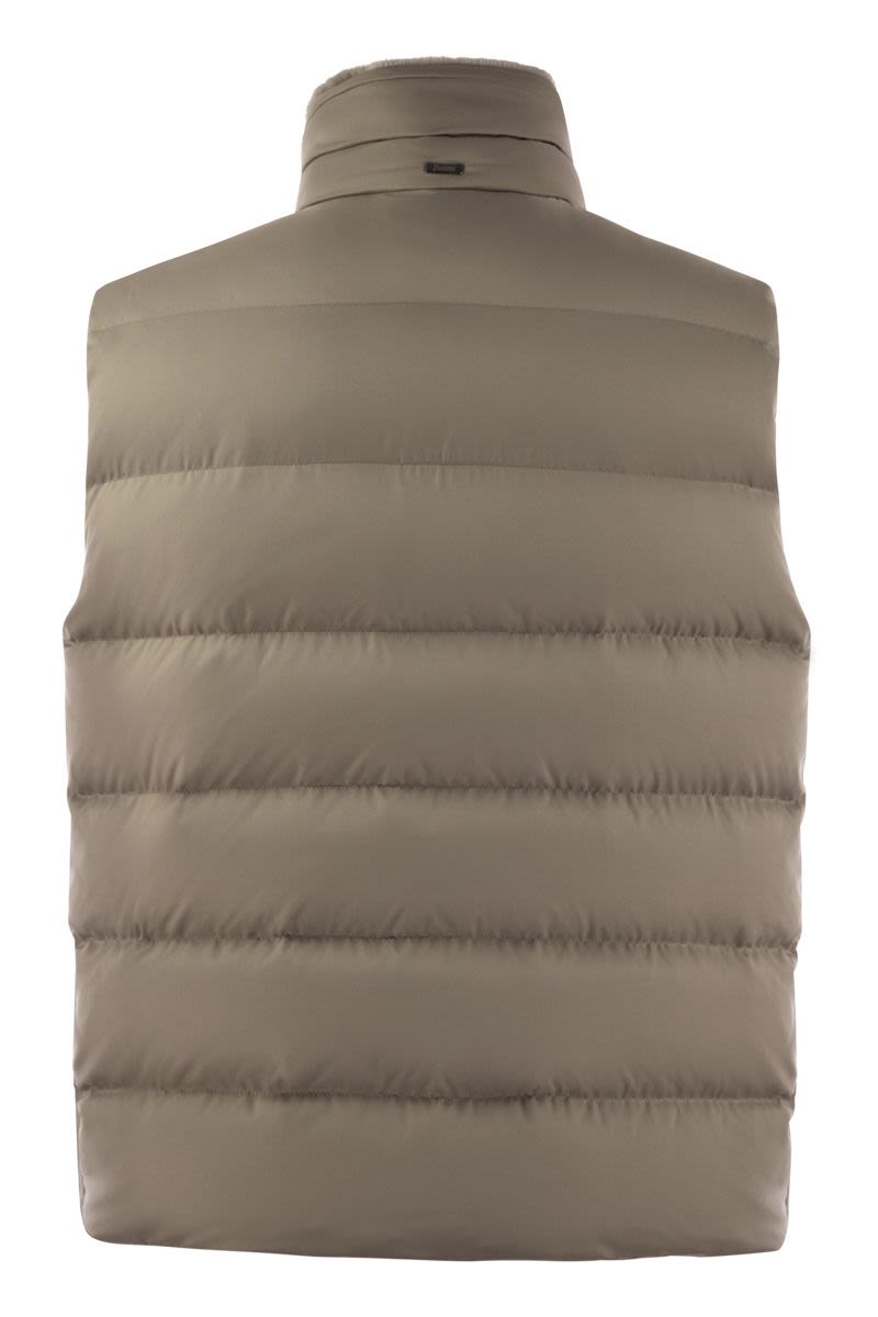 Down-filled waistcoat with fur insert