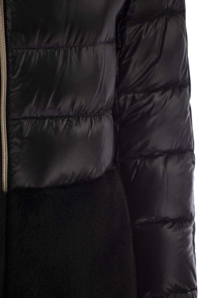 Down jacket with cruelty-free fur details