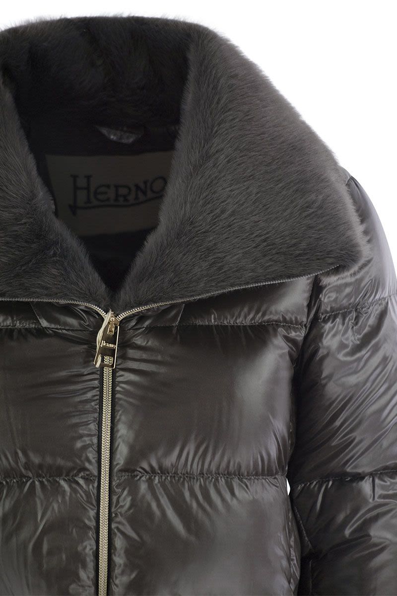 Down jacket with cruelty-free fur details