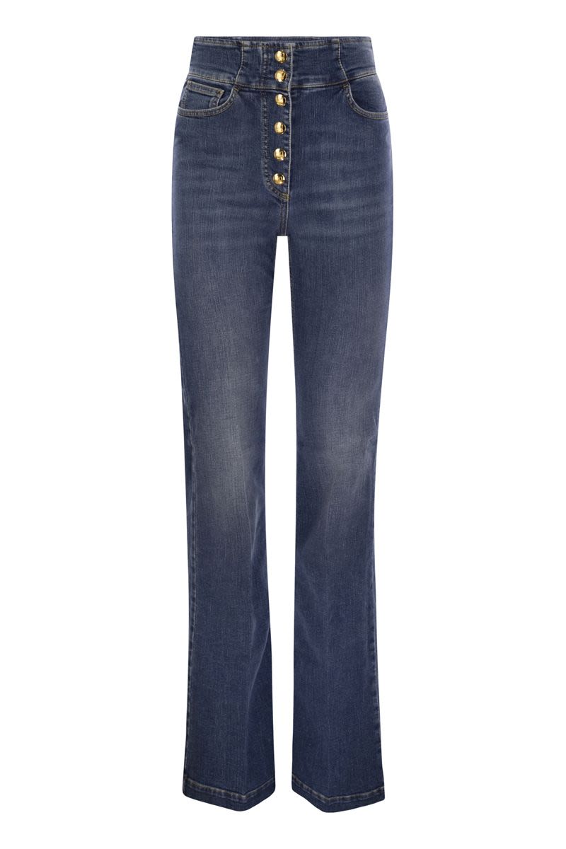 Stretch cotton flared jeans with central button placket