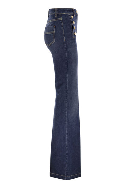 Stretch cotton flared jeans with side button fastening