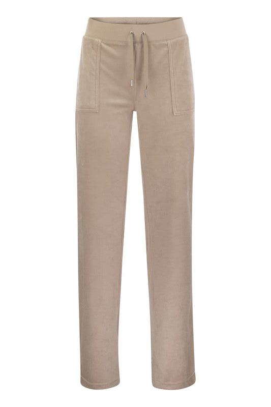 Trousers with velour pockets