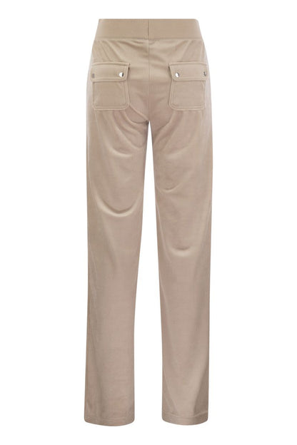 Trousers with velour pockets