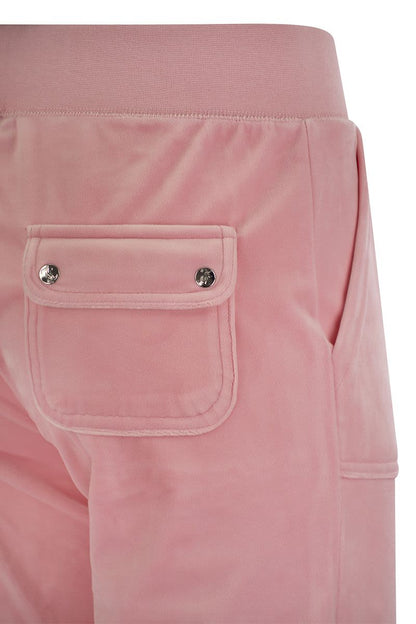 Trousers with velour pockets