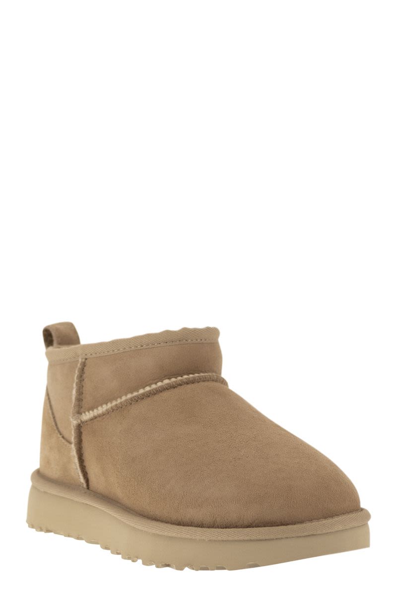 CLASSIC ULTRA MINI - Sheepskin boot